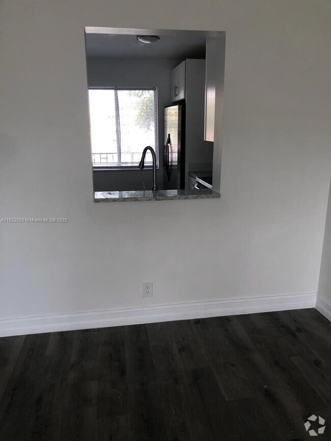 Building Photo - 8550 N Sherman Cir