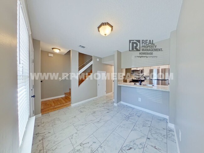 Building Photo - Updated Spanish Trail Townhome | 2BR/1.5BA | Fenced Yard | Near UWF & Hospital