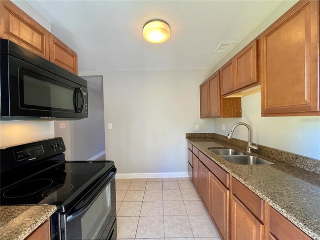 Building Photo - 8724 N Larkhall Pl