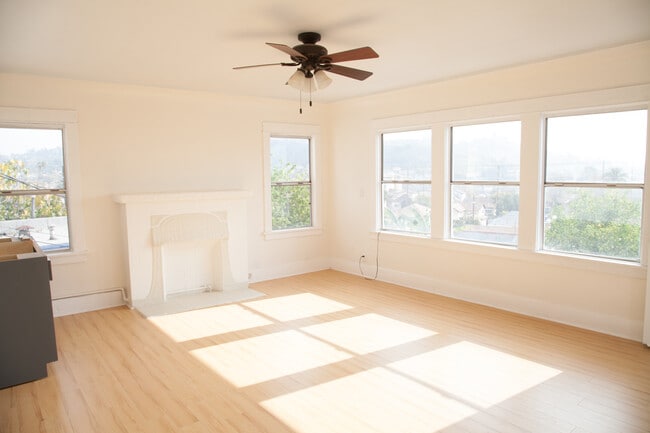 Living room w big windows - 3435 N Figueroa St