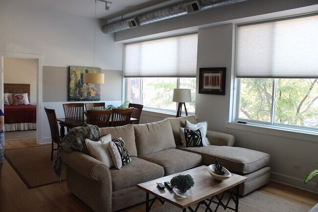 Main shared area from master bedroom door area (previous tenants furnishings) - 4751 N Artesian