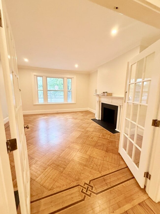 Building Photo - Brookline Row House with Covered Parking