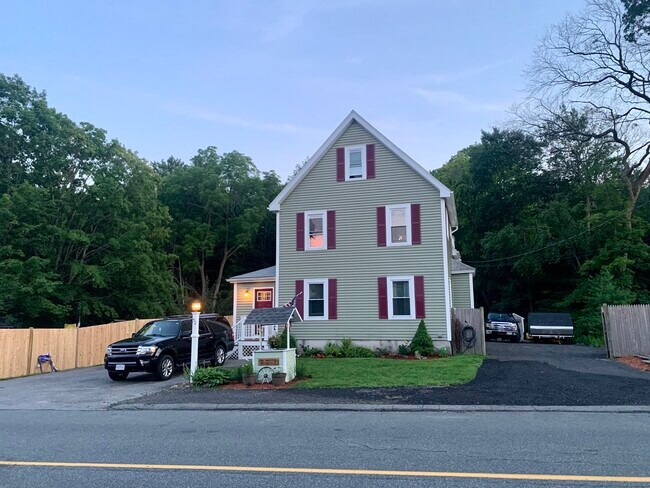 Front exterior of house and view of both driveways - 72 Spring St