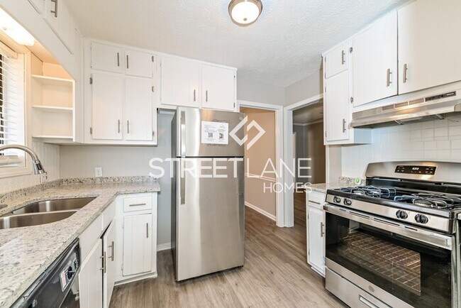 Building Photo - REDUCED!- Now offering $750 off first full...