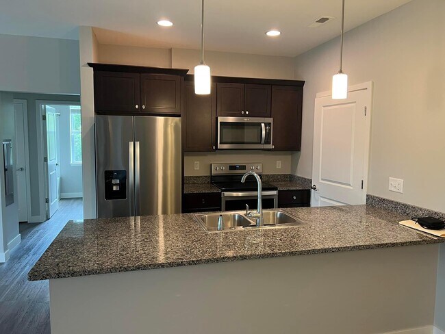 Kitchen with all stainless steel appliances. - 2177 Willenbrock Cir