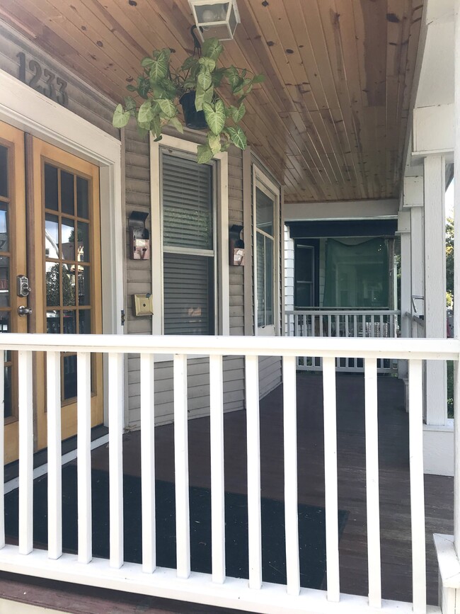 Updated in 2019, front porch. - 1233 Jenifer St