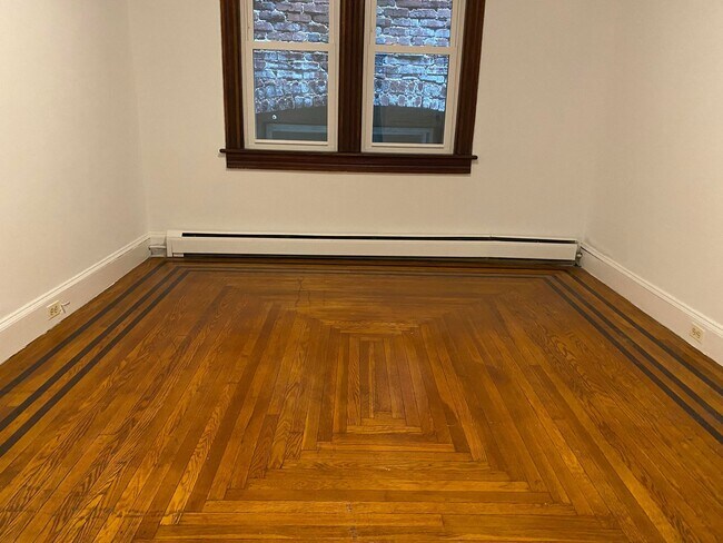 bedroom with hardwood - 36 Market St