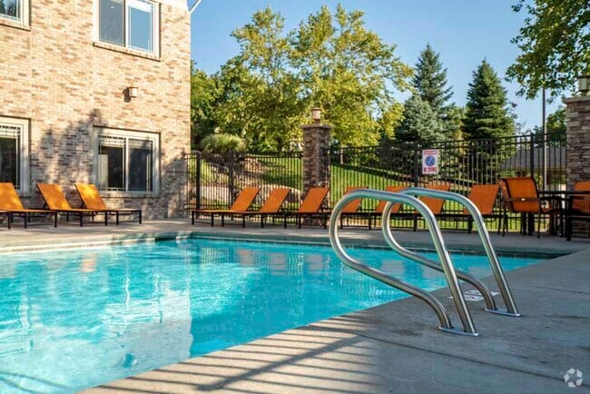 Relax and unwind by the swimming pool on sunny afternoons. - Grand Legacy