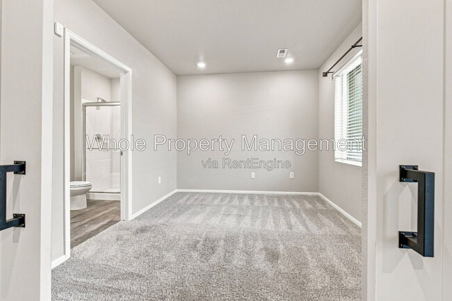 Photo - 12231 West 57th Drive Townhome