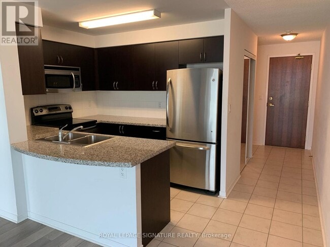 Photo du bâtiment - 4900-4900 Glen Erin Dr