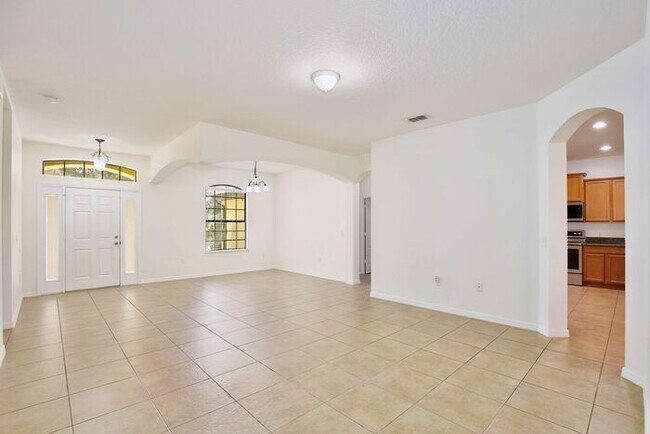 Foto del edificio - Water-View 4BR/3BA with 3-Car Garage in Gated North Shore - Near Lake Nona & Medical City