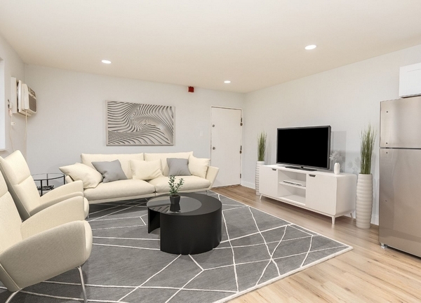 Living Area- Renovated - Downing Apartments