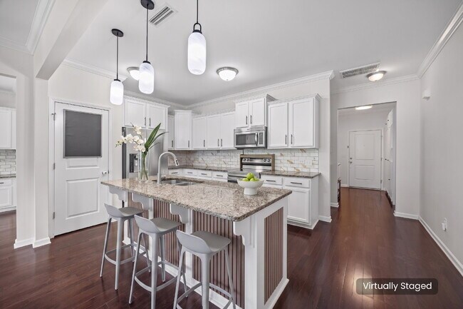 Building Photo - "Spacious 3-Bedroom Townhome with Fireplace, Pergola & Community Pool on Summerlake Drive!"