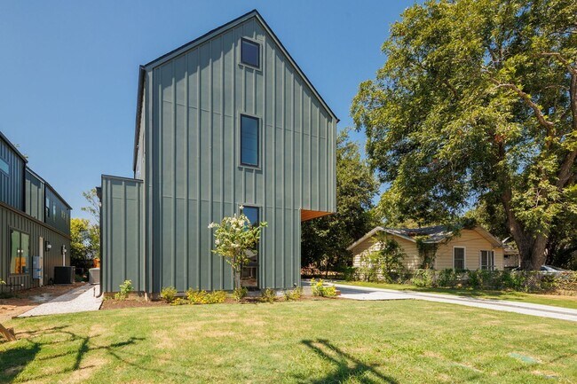 Building Photo - Luxury Redefined: Experience Vibrant Living in this 3-Bedroom Haven in East Austin