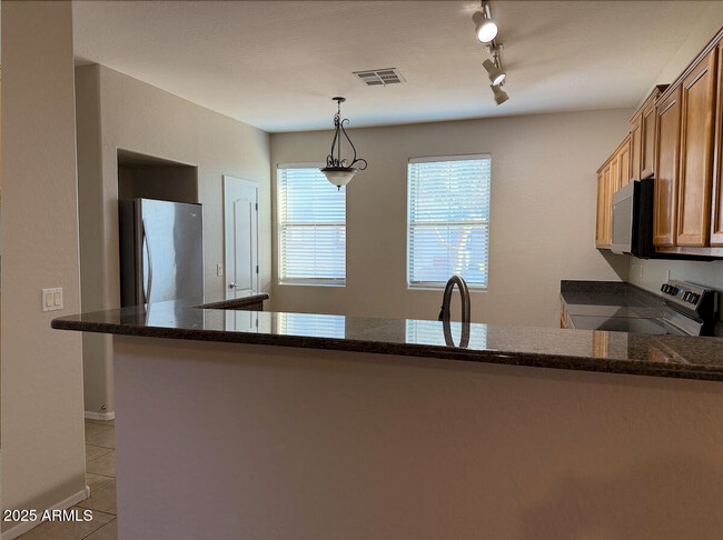 Building Photo - 996 E Cantebria Dr