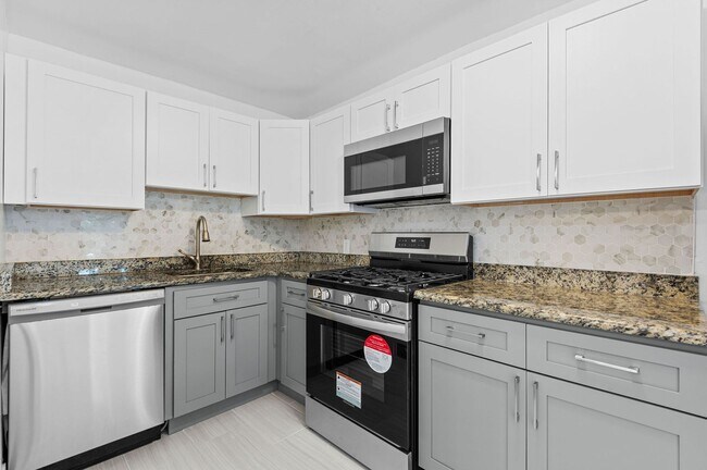 Building Photo - 1st MONTH FREE!* Newly renovated kitchen w...