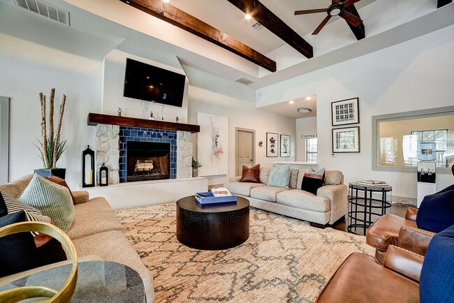 Cozy fireplace in the resident lounge - Azul Apartment Homes