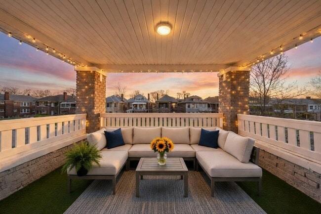 Covered Balcony. Image is virtually staged - 1975 Gladstone St