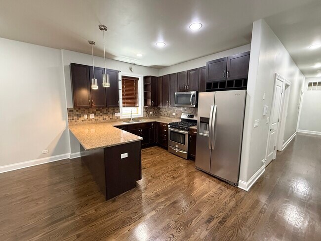 Foto del edificio - 3862 S Lake Park Ave