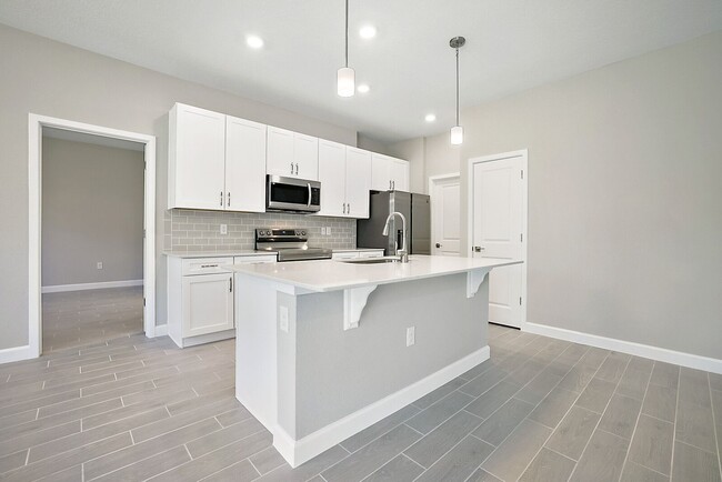 Building Photo - Enjoy modern living in this newly built re...