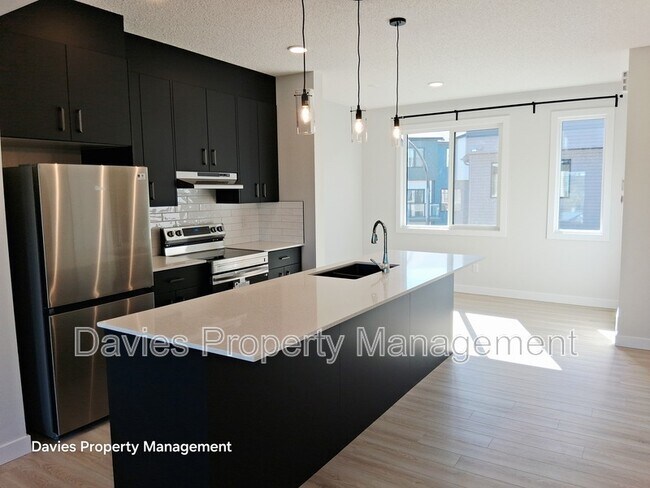 Building Photo - 11910-11935 35 Ave SW