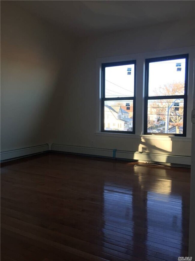 Building Photo - 160-02-160-46 46th Ave