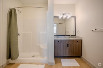 2BR, 2BA - 925SF - Verbena Bathroom 1 - Meridian at Wylie - 55+ Affordable Apartments
