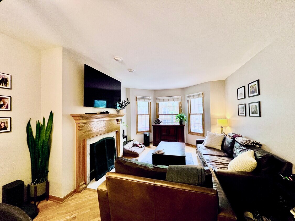 1 of 2 (!) Spacious Open Living Room layout with Bay Windows & Fireplace - 1059 W Cornelia Ave