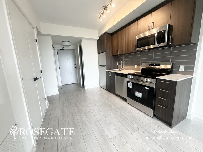 Building Photo - Modern 1 Bedroom + Den Condo with Balcony, Parking & Internet Included – Milton