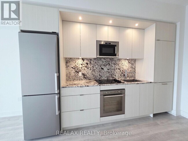 Photo du bâtiment - 30 Inn On The Pk Dr