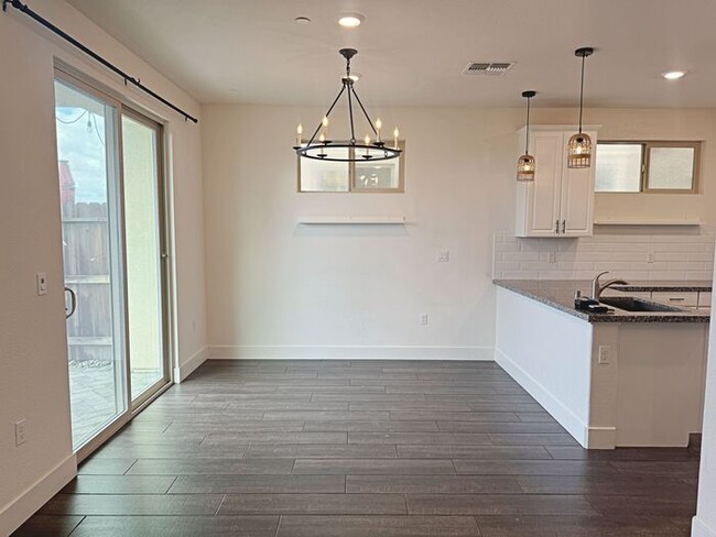 Building Photo - 8984 Upbeat Wy