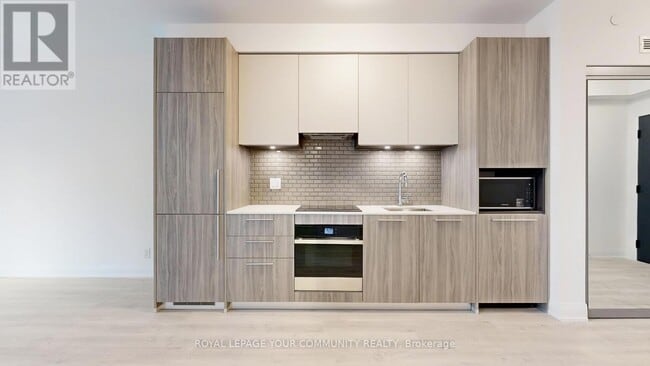 Building Photo - 65 Broadway Ave