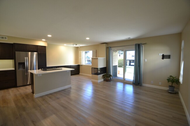 Building Photo - New Updated Main Level Condo with 24/7 Sec...