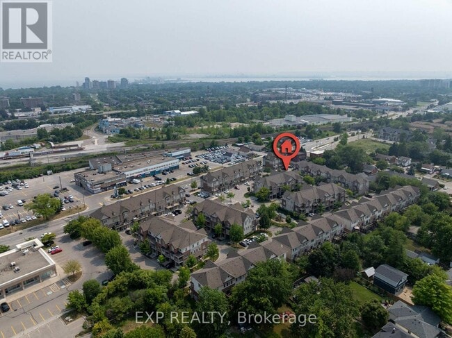 Photo du bâtiment - 1401-1401 Plains Rd E
