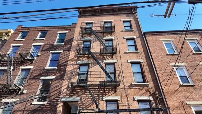 Building Photo - Fresh, Two-Story OTR Duplex with Downtown Views – Renovated 3BR/2BA, In-Unit Laundry