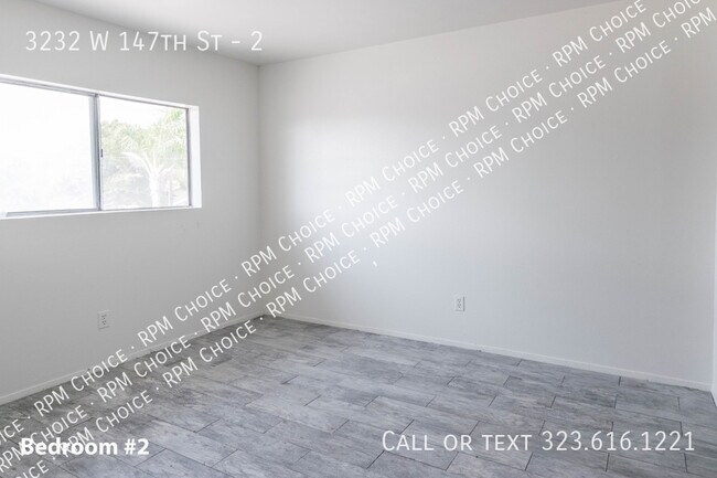 Building Photo - Large 2bd/1ba 750 sqft Quality Unit