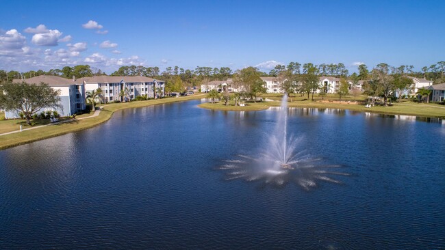 Stroll along the serene lake paths, savoring lakeside luxury with scenic views that embrace the community's natural beauty. - Grand Oaks At The Lake