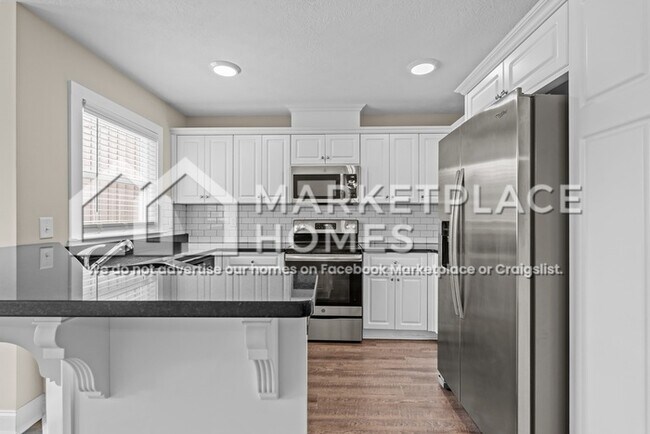 Foto del edificio - 100 Downsbury Rd