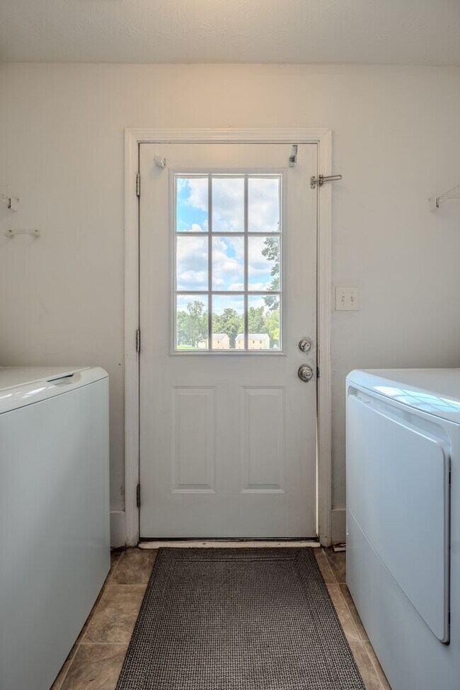 Building Photo - Spacious 4BR/3BA Townhome | Pet Friendly | Washer & Dryer Included | $1,600/mo