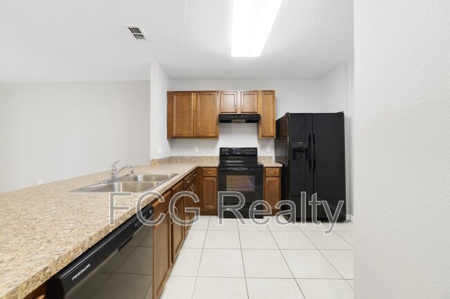 Photo - 443 Arbor Lakes Dr Townhome