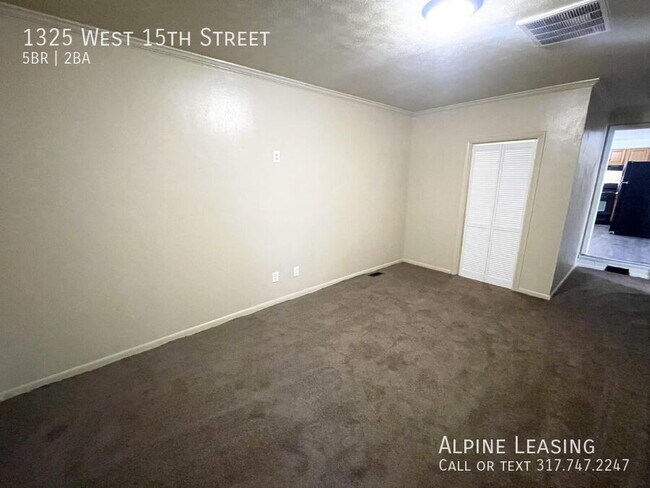 Building Photo - 1325 W 15th St