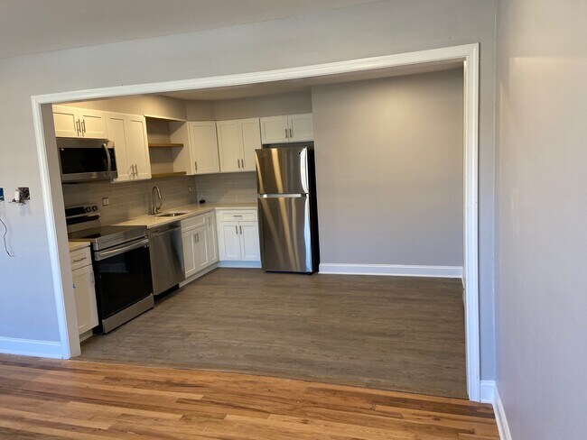 open kitchen with dining area - 705 N Dudley Ave