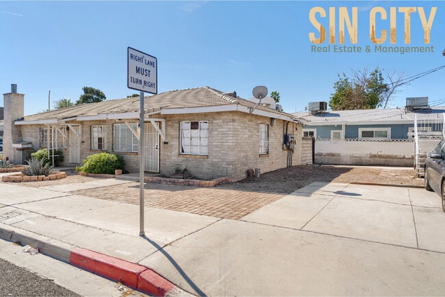 Building Photo - "Charming 1-Bed Duplex with Hardwood Elegance in Downtown Las Vegas!"