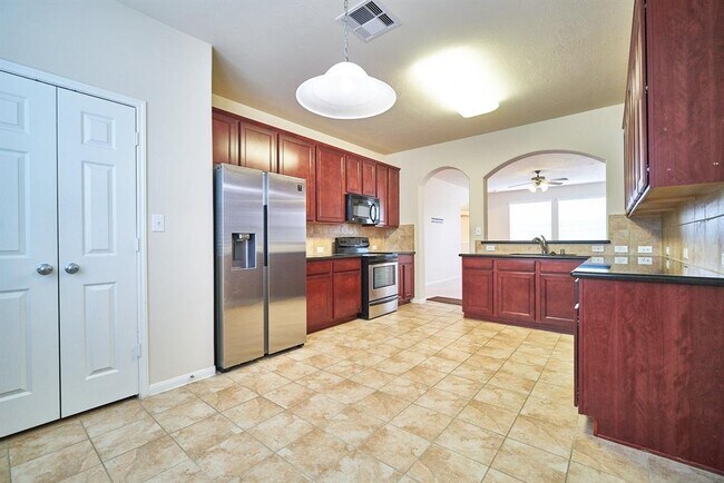 Foto del edificio - 8803 Cedar Mound Ln