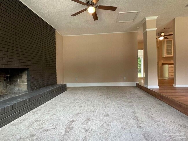 Building Photo - 6975 Woodley Dr