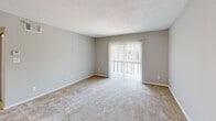 Located at 6033 Sunbeam Ln in Knoxville, TN, this single-story, one-bedroom, one-bathroom unit offers a well-organized and functional layout. The open-concept living, dining, and kitchen area forms the heart of the home, providing a comfortable and connected space for everyday living. The living area features neutral-toned carpeting, soft gray walls, a textured ceiling, and a sliding glass door fitted with vertical blinds that opens to a private balcony, allowing natural light and outdoor views of the surrounding greenery to fill the room. The kitchen is equipped with white cabinetry, dark laminate countertops, a double stainless steel sink, and a dishwasher, complemented by wood-look vinyl flooring. A pantry offers additional storage convenience. The generously sized bedroom includes a built-in closet, plush carpeting, and two windows that provide ample natural light. The bathroom features a combined tub and shower, a rich wood-toned vanity with a stone-look countertop, and wood-look vinyl flooring. Additional features include a utility room, a hallway with extra closet space, and a dedicated entrance area, rounding out a practical and comfortable living space.