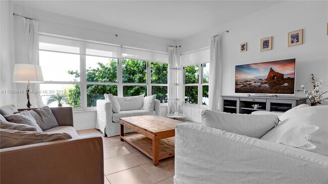 Foto del edificio - 9100 W Bay Harbor Dr