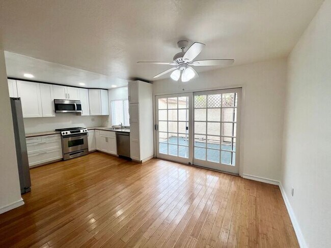Foto del edificio - Stunning 4BR Townhome with Hardwood Floors, Private Patio, Community Pool & 2-Car Garage!