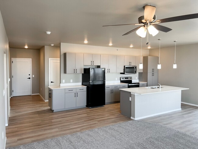 Brand New Building - Now Leasing! Visit UHVSF.COM - University Hills Village