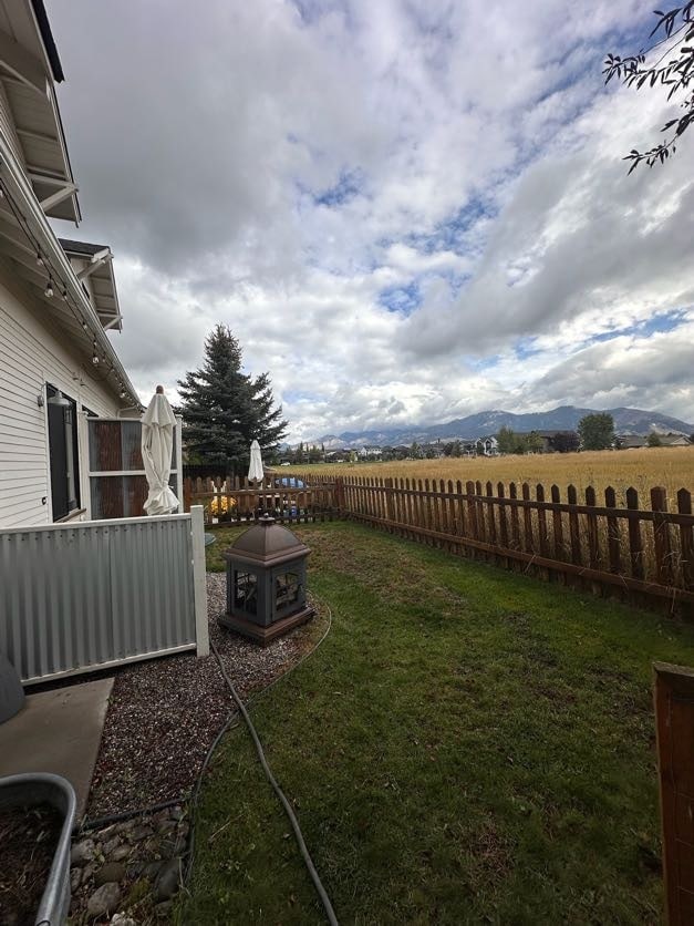 View of fenced backyard - 912 Matheson Way